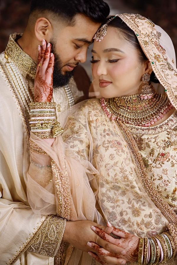 Bride and groom, forehead to forehead