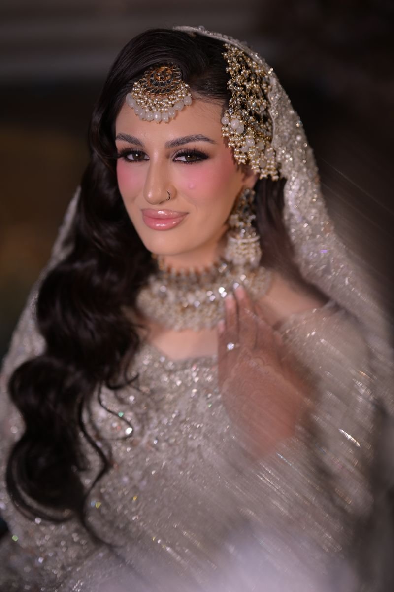 Bride in a jewelled dupatta